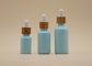 Покрасьте покрывая небесно-голубые бутылки эфирного масла 15мл 30мл с бамбуковой капельницей