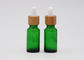 Бутылки капельницы зеленого масла 18мм косметические стеклянные с бамбуковой пипеткой печатания капельницы