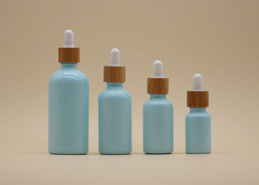 Покрасьте покрывая небесно-голубые бутылки эфирного масла 15мл 30мл с бамбуковой капельницей